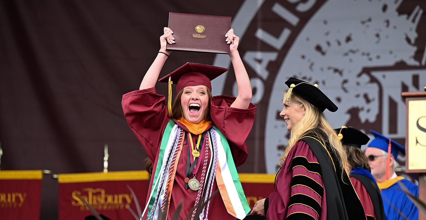 Student with diploma
